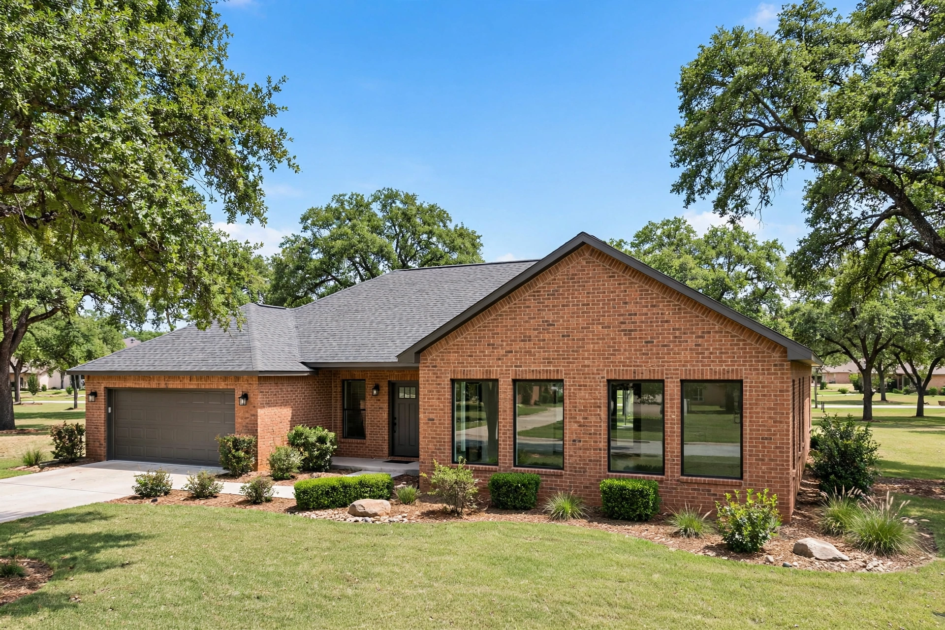 Home Additions Allen TX - Family Room Addition, Matched Brickwork Texas suburban brick home with a new family room addition featuring matched brick and roofline